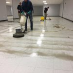 Commercial cleaning white floor by three Master Kleen professionals in North Huntingdon, PA