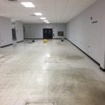 Half clean white floor during commercial cleaning in North Huntingdon, PA