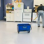 Master Kleen professional holding commercial cleaning equipment in North Huntingdon, PA