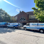 Three carpet cleaning trucks outside business in North Huntingdon, PA